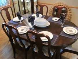 Queen Anne style dining table with 6 chairs and extra leaves. Richard Ginori Tureen with under-plate. Royal Doulton crystal goblets.Faberge Plates.