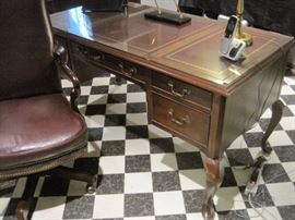 Mahogany writing desk and leather desk chair, both by Hekman.