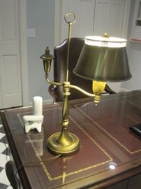 Brass desk lamp.