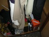 bottles at the bottom of a closet.