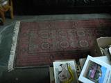 One of many rugs and books