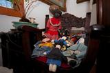 Dolls. There will also be a lot of old madame alexander dolls in boxes.