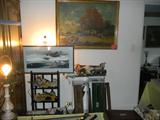 main level - steiff paintings, mangle boards behind the counter.