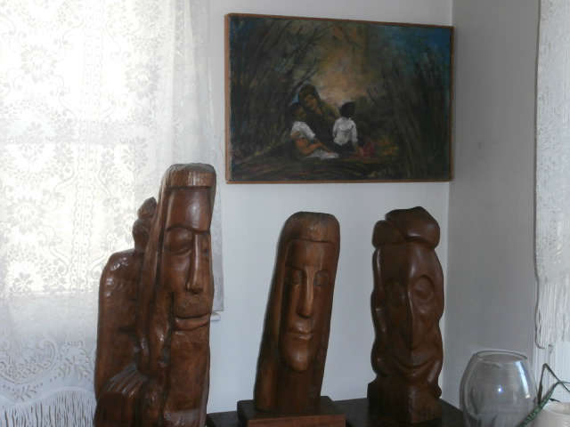 Three of Great Grandma's sculptures and one of her paintings.