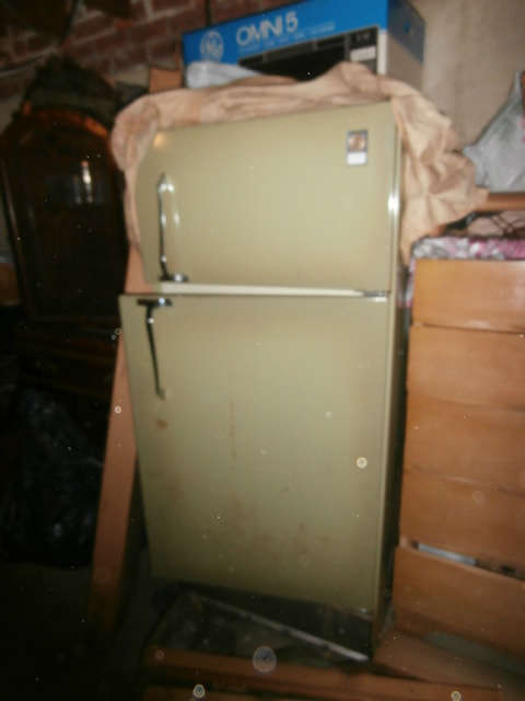 Mid Century Fridge in the basement - $100 and its yours. You move it.