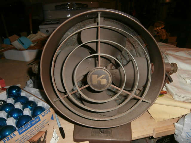 Vintage Fan  -  $30.  There are at least a half dozen fans in the house.
