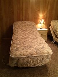 #73 (2) Flexible remote twin beds w/mattress $150 each