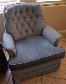 One of a pair of upholstered chairs