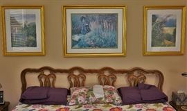 King size bed and art prints