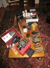 Cameras, Kodak, Bronica, duraflex, tower 41, polaroids, Brownie, Beacon, Sad Irons etc