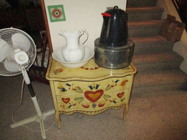 painted commode, old film can