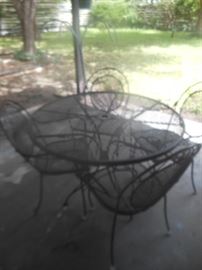 Metal patio table and 4 chairs
