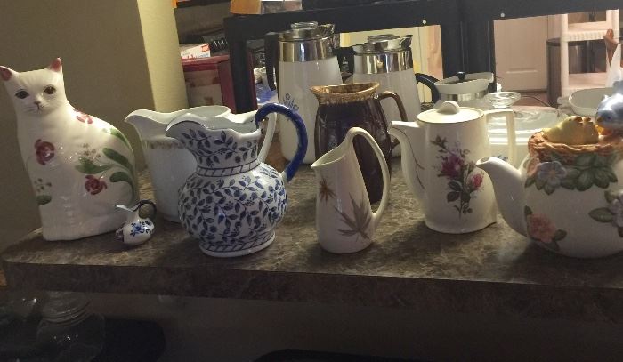 Pitchers, teapots, and don't forget the cat