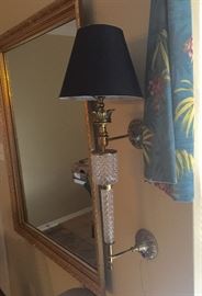 Large mirror and wall lamp