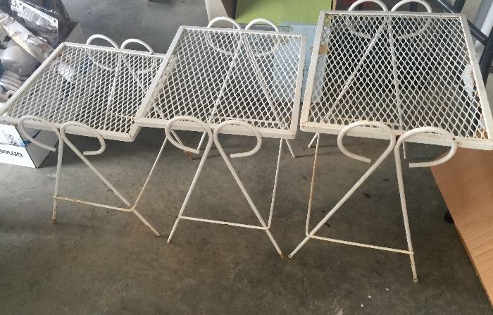 Three little sturdy metal tables for inside or outside furniture. 