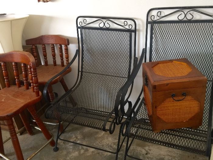 Low bar stools and wrought iron patio chairs 
