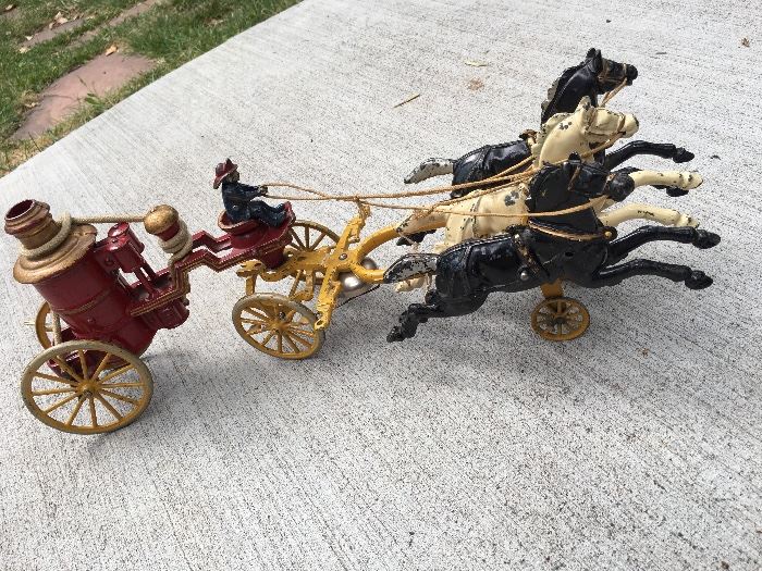 Very cool Hubley (?) cast iron fire truck with three horses.  Nice gift for your favorite firefighter! (THE RESERVE PRICE ON THIS ITEM IS $200.)