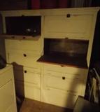 tall painted cabinet with 8 drop down drawers