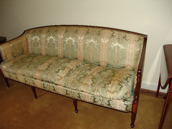Nice Regency style sofa upholstered in silk fabric. 