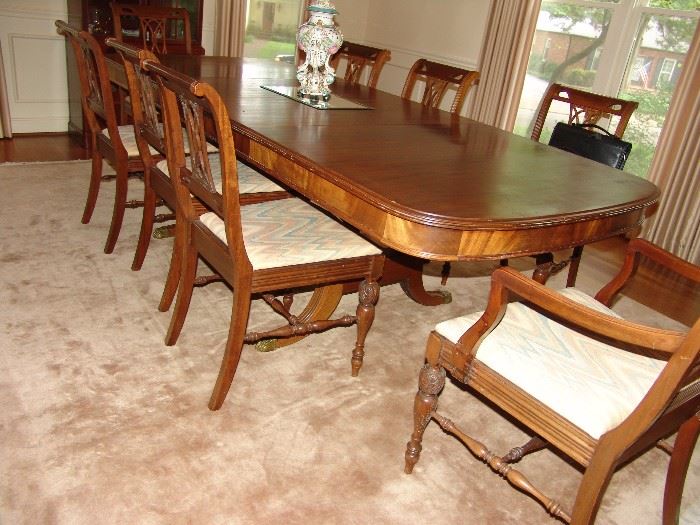 Mahogany banquet size dining table and 8 chairs