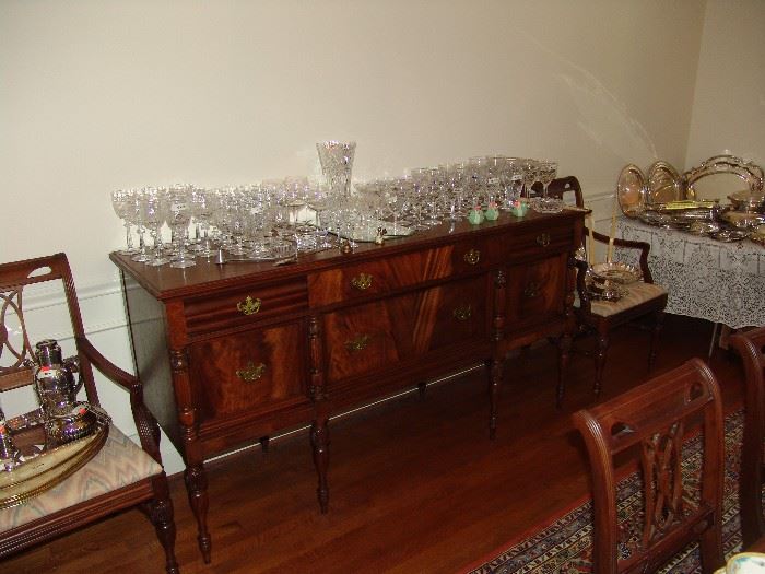 Mahogany buffet and large assortment of cut leaded crystal stemware