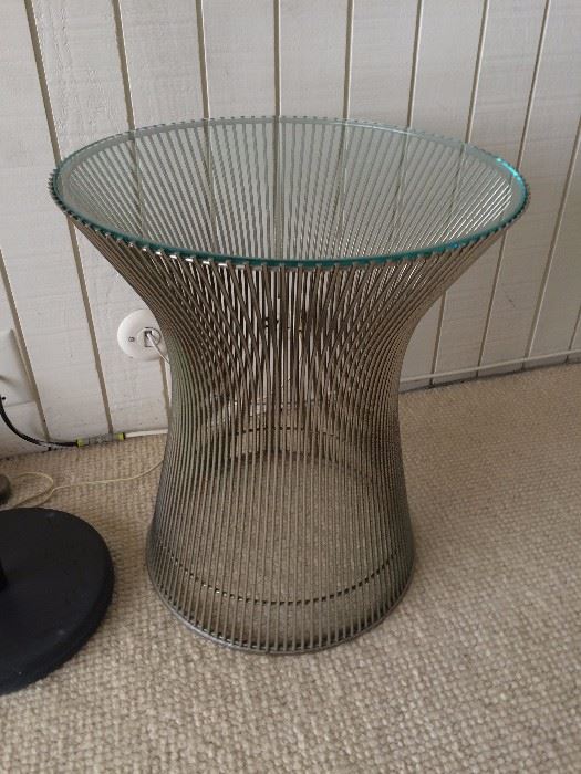 Warren Platner Side table.OF THE PERIOD
Mid-Century Modern
PLACE OF ORIGIN
United States
DATE OF MANUFACTURE
circa 1960s
PERIOD
1960-1969
COLOR
Gray
MATERIALS AND TECHNIQUES
Glass, Nickel, Steel
CONDITION
Good. The Tines have some pitting.
WEAR
Wear consistent with age and use. THe Plastic seal is perfect and intact.
DIMENSIONS
18.25 in.H
46 cmH
DIAMETER
15.75 in. (40 cm)