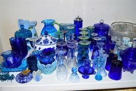Miscellaneous blue glassware for sale.