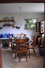 Everything with the exception of the white table shown in this photo is for sale.