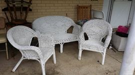 3 Piece White Whicker Set. Also, a 3 person porch glider is ready for a re-purposer to work his/her magic to restore it to its original glory is for sale. 