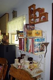 One of the 3 baker's racks, cookbooks and more decorative shelving for sale