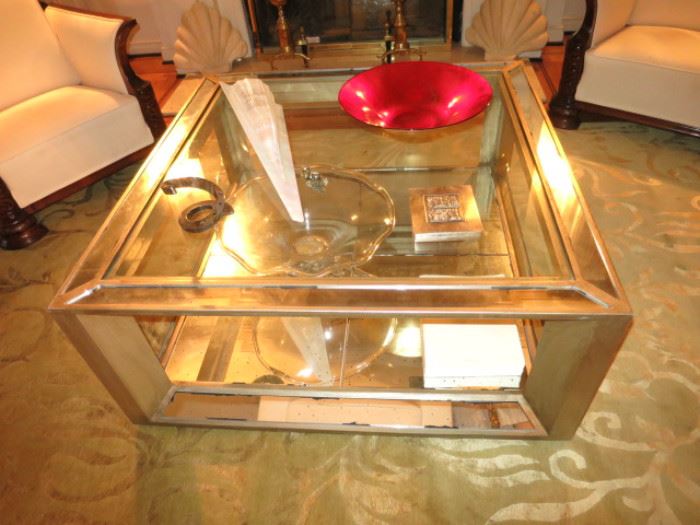 Glass, Mirror and Silvered Open Cube Coffee Table; with a Silver-on-Copper Cigarette/Card Box; a Gold-Leaf Red Glass Center Bowl, and a 1960's Dansk Silverplate Swirl Candlestick