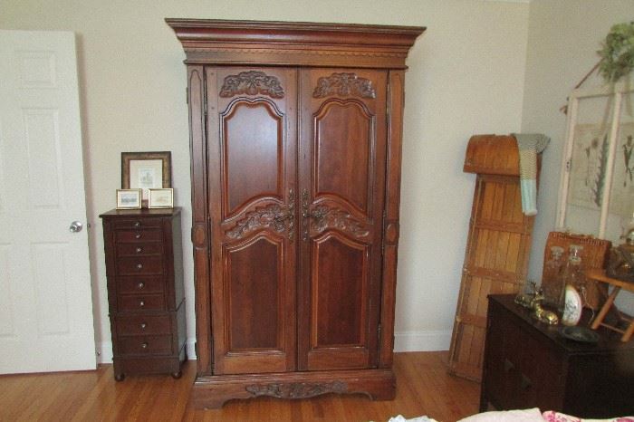 Hooker Furniture Armoire with storage shelves and hanging rod