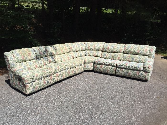 Large sectional in EXCELLENT condition.  (That IS NOT a stain -- it is the shadow from the trees)  This piece is exceptional.  Three recliners, and a sleeper section.