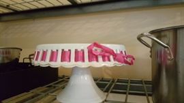 glass cake platter with pink ribbon