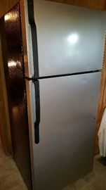 GE 18 cu ft. SS and black Top Mount refrigerator 