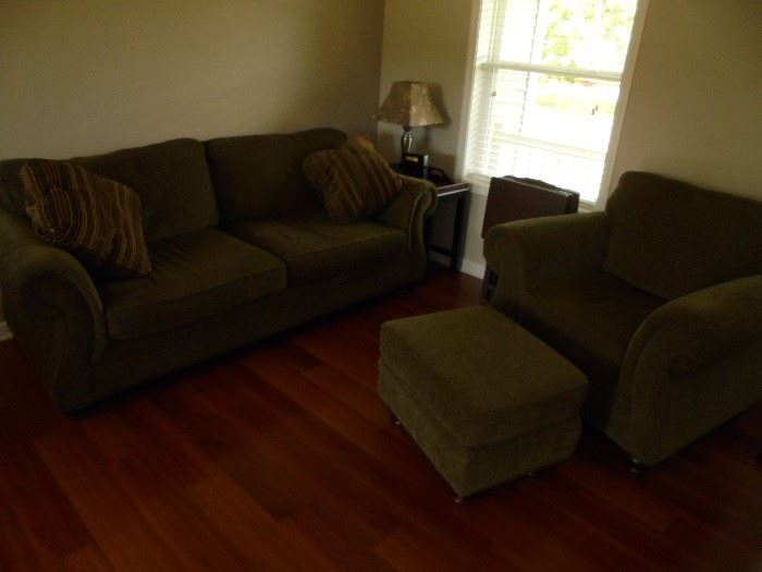 All like new..... couch, chair and ottoman set, wooden tv chairs, side table, and lamp.