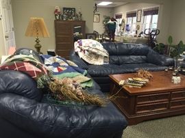 Vintage quilts and mirror front chest in the background. The coffee table is NOT for sale. 