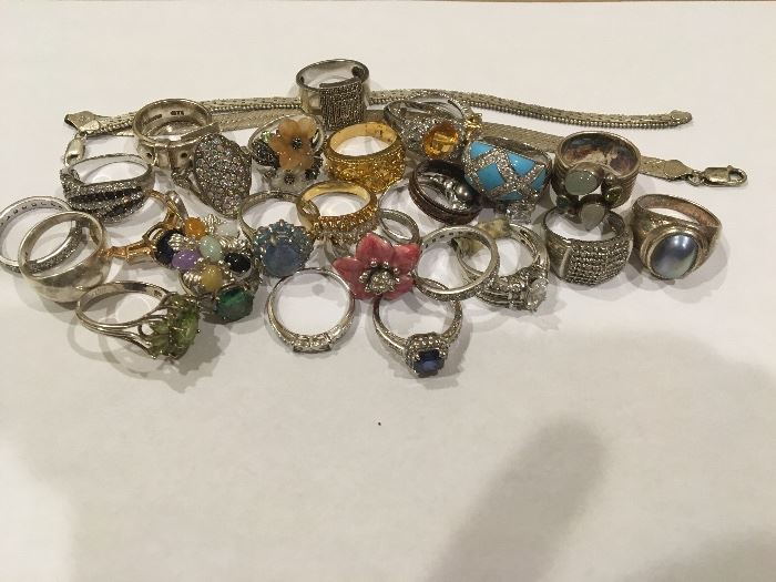 many pieces of sterling silver including vintage rings and bracelets