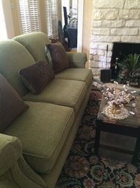 Green sofa - great condition - with coordinating decorative pillows