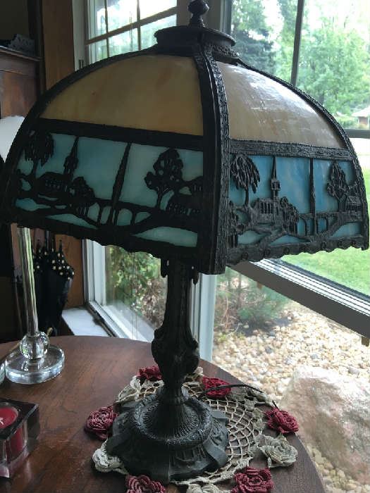 Art deco tiffany style slag glass vintage lamp with what appears to be bronze base.  