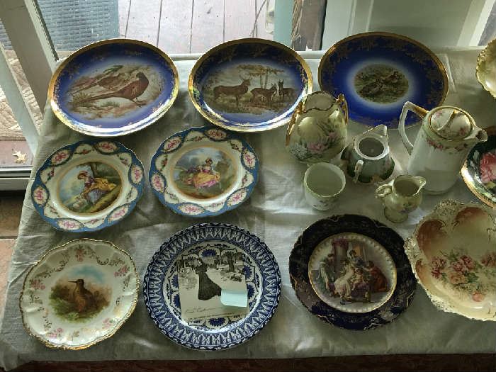 More hand painted antique plates and bowls.