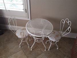 children write iron table with 2 chairs