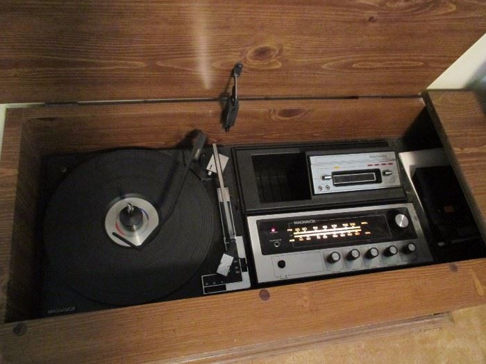 Magnavox console stereo with turntable, radio, 8-track player and cassette adapter