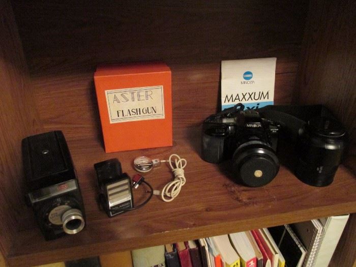antique Kodak Brownie movie camera and Minolta Maxxum 3xi