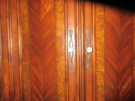 Amini amoire. For 26 years, AICO/Amini Innovation Corp has been known for original, high quality and intricately designed home furnishings. CEO and Founder, Michael Amini, combines his extensive world travels and his affinity for fashion to create the inspiration for each distinctive design. From the ancient ruins of Greece, to Russian palaces; from the sunny hillsides of Tuscany, to the charming cafes of a crowded Paris street, Michael finds inspiration in world culture, traditional art and architecture. It is his goal to create furniture that connects people emotionally with their culture, country and heritage.
In addition to Michael’s passion for design and fashion, he strives to lead by example in producing unmatched quality combining Old World craftsmanship with the most modern production techniques. This commitment to quality and innovation is the cornerstone to his ability to create intricate designs rich with hidden extras and features that cater to the needs and desires of the