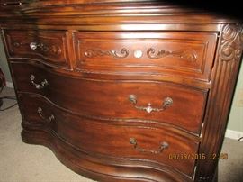 Amini amoire. For 26 years, AICO/Amini Innovation Corp has been known for original, high quality and intricately designed home furnishings. CEO and Founder, Michael Amini, combines his extensive world travels and his affinity for fashion to create the inspiration for each distinctive design. From the ancient ruins of Greece, to Russian palaces; from the sunny hillsides of Tuscany, to the charming cafes of a crowded Paris street, Michael finds inspiration in world culture, traditional art and architecture. It is his goal to create furniture that connects people emotionally with their culture, country and heritage.
In addition to Michael’s passion for design and fashion, he strives to lead by example in producing unmatched quality combining Old World craftsmanship with the most modern production techniques. This commitment to quality and innovation is the cornerstone to his ability to create intricate designs rich with hidden extras and features that cater to the needs and desires of the