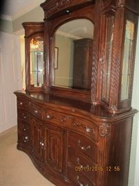 Amini dresser and lighted curio/mirror. For 26 years, AICO/Amini Innovation Corp has been known for original, high quality and intricately designed home furnishings. CEO and Founder, Michael Amini, combines his extensive world travels and his affinity for fashion to create the inspiration for each distinctive design. From the ancient ruins of Greece, to Russian palaces; from the sunny hillsides of Tuscany, to the charming cafes of a crowded Paris street, Michael finds inspiration in world culture, traditional art and architecture. It is his goal to create furniture that connects people emotionally with their culture, country and heritage.
In addition to Michael’s passion for design and fashion, he strives to lead by example in producing unmatched quality combining Old World craftsmanship with the most modern production techniques. This commitment to quality and innovation is the cornerstone to his ability to create intricate designs rich with hidden extras and features that cater to th