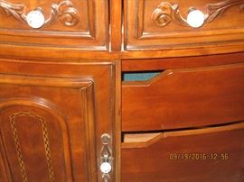 Amini dresser and lighted curio/mirror. For 26 years, AICO/Amini Innovation Corp has been known for original, high quality and intricately designed home furnishings. CEO and Founder, Michael Amini, combines his extensive world travels and his affinity for fashion to create the inspiration for each distinctive design. From the ancient ruins of Greece, to Russian palaces; from the sunny hillsides of Tuscany, to the charming cafes of a crowded Paris street, Michael finds inspiration in world culture, traditional art and architecture. It is his goal to create furniture that connects people emotionally with their culture, country and heritage.
In addition to Michael’s passion for design and fashion, he strives to lead by example in producing unmatched quality combining Old World craftsmanship with the most modern production techniques. This commitment to quality and innovation is the cornerstone to his ability to create intricate designs rich with hidden extras and features that cater to th