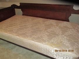 Beautiful solid wood daybed with twin mattress and room for trundle