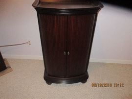 Beautiful wood roll front storage for cds/dvds